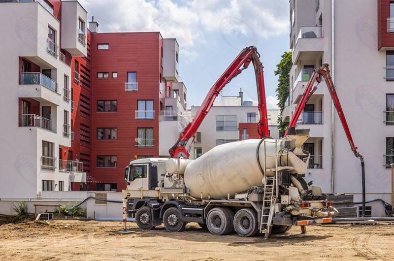 Concrete mixer truck at construction site