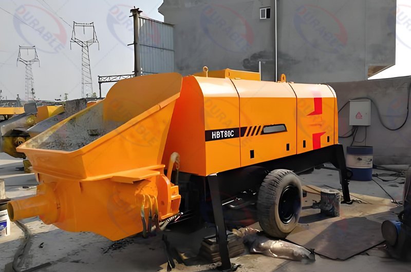 Trailer-mounted concrete pump working site